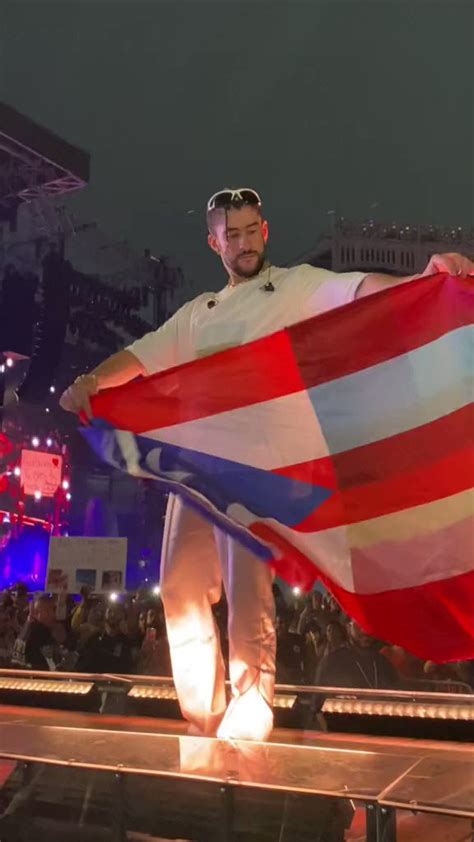 Bad Bunny performing on stage, showcasing his Puerto Rican heritage.